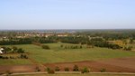 Blick auf das norddeutsche Tiefland mit vielen Äckern, Wiesen und Waldflächen